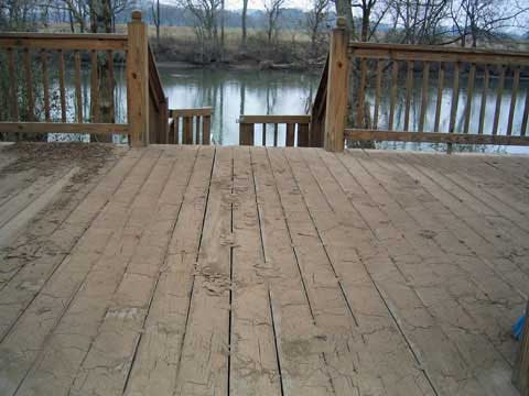 Deck with dried mud before cleaning
